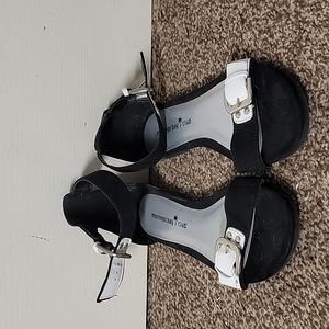 Black and white ankle strap sandals